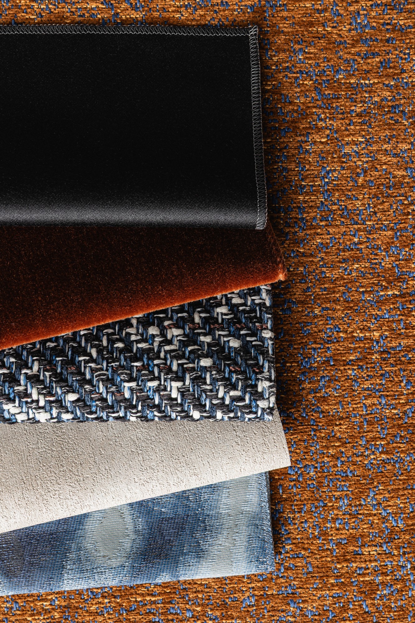 4328-11 Wisteria River Canyon, 4705-18 Hint Black Briefcase, 5515-11 Empire - Burnt Orange, 4365-05 Toccata Navy Terrazzo, V105-03 Central Crater, 4591-07 Dorado Midnight Hero Image