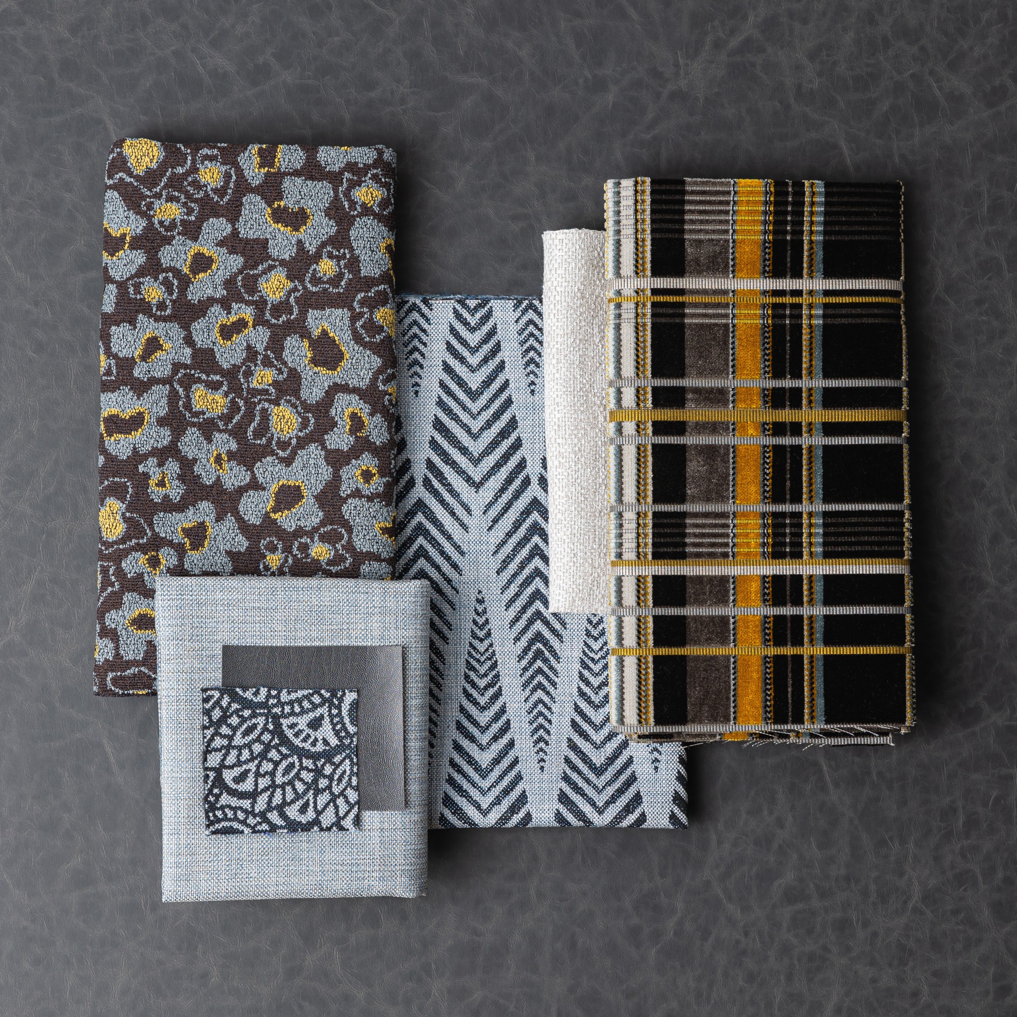 Aries - Graphite, Tulliana - Zodiac Moth, Bower - Ice Crystals, Galapagos - Charcoal, Lotus - Deep Sea, Calathea - Deep Sea, Stellula - Ski Slope, Longji - Yellow Jacket Hero Image