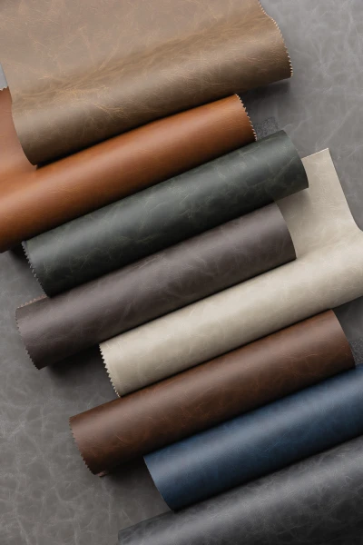 6818 Aries Saddle, Burnt Sienna, Deep Olive, Graphite, Platinum, Cocoa, Midnight, Almost Black Hero Image